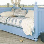 The thick pillows and cushions along the back of the daybed reduce the depth of the seat.